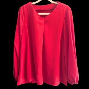Red blouse with cuffed sleeves